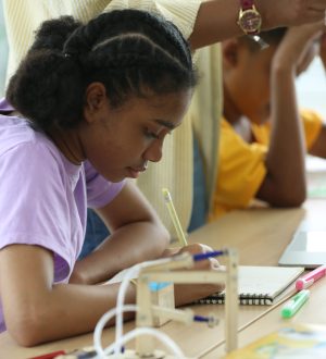 side-view-african-american-student-reading-note-2026-03-18-07-09-01-utc